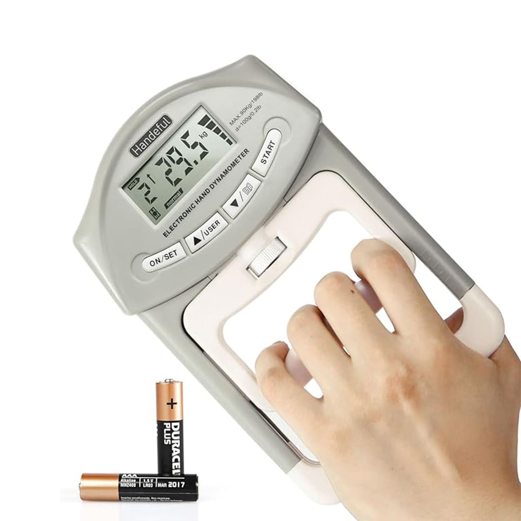 GripPro Digital Hand Dynamometer measuring grip strength with LCD display and batteries beside it.