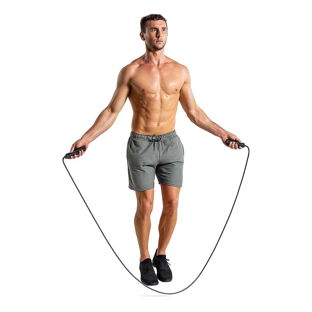 A fit male athlete using the SwiftRope – High-Speed Jump Rope for a cardio workout.