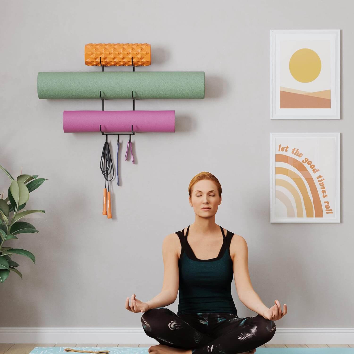 Medivita FlexRack Organizer holding yoga mats and fitness accessories in modern home gym decor.